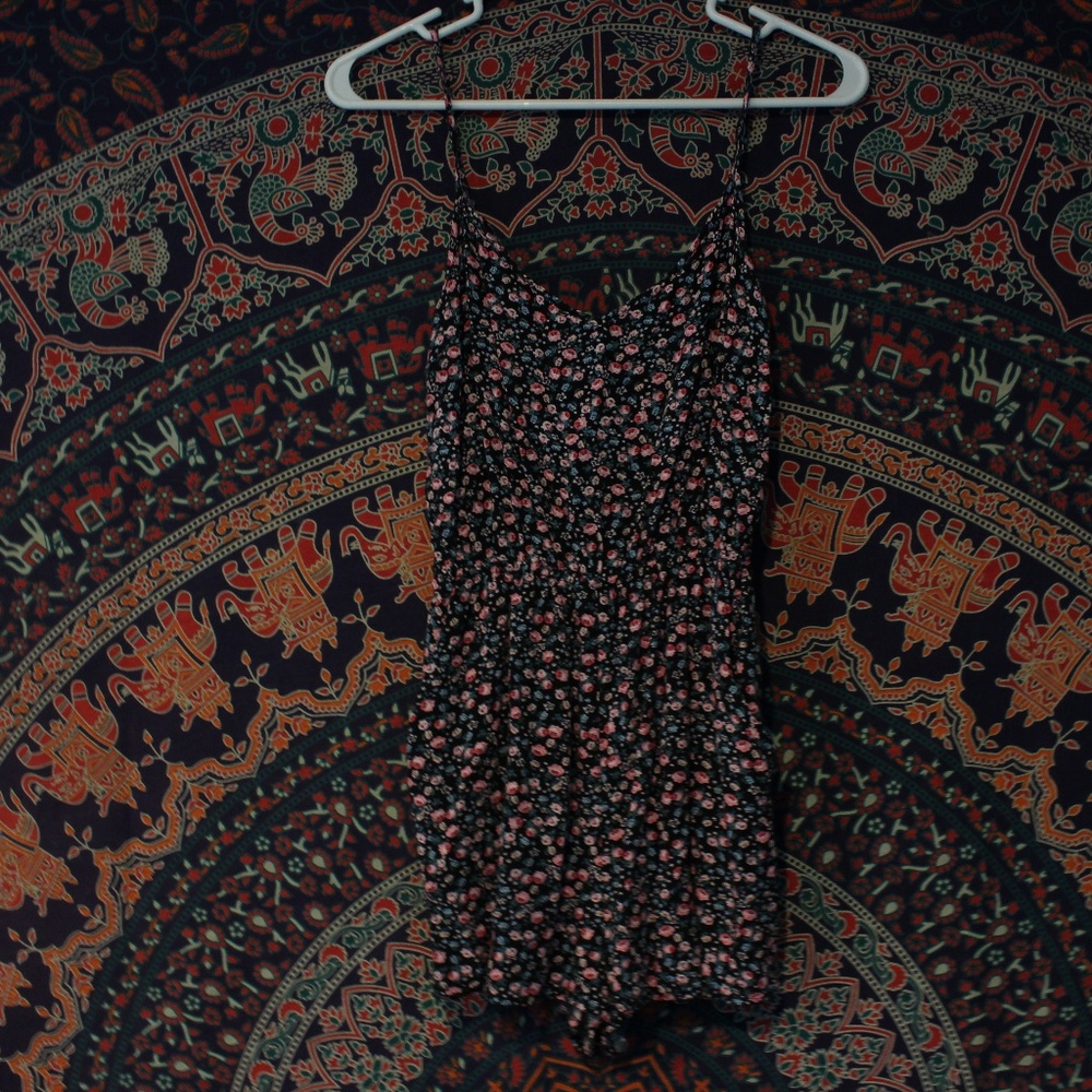 Black Floral Romper with Cross-Pattern Back Cutout